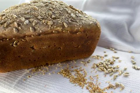 Freshly cooked home made bread, with sesame seed and sunflower Stock Photos