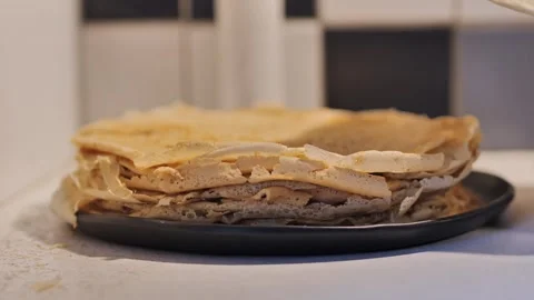 Freshly Cooked Pancake Added to Stack - Golden Layers for a Cozy Morning 스톡 동영상 291104450