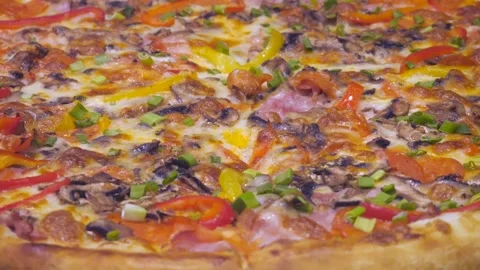 Freshly cooked pizza close-up. Stock Footage 297624640