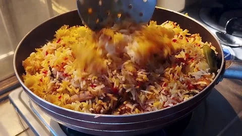 A freshly cooked pot of Chicken Biryani. Stock Footage 340383598