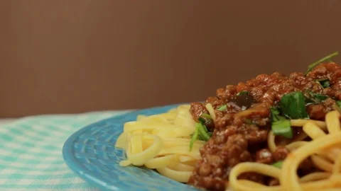 Freshly cooked spaghetti covered with tomato sauce Stock-Footage 73968000