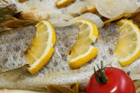 Freshly cooked trout Photos