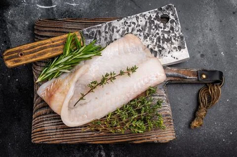 Freshly cut cod fish fillet, highlighting its mild taste and versatility in.. Stock Photos