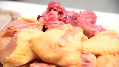 Freshly cut free-range chicken. High quality chicken meat ready to cook Vidéo 153274267