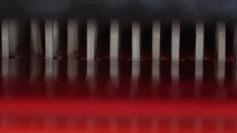 Freshly Dipped Red Match Heads Dripping in Rows at Match Factory Macro Stock Footage 339736751