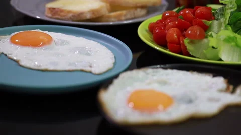 Freshly Fried Egg Served on a Plate Stock Footage 160139977