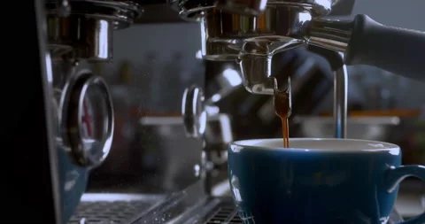 Freshly ground coffee flows. Drink roasted black coffee in the morning. Prepare Stock Footage 239386746