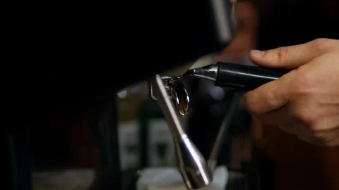 Freshly ground coffee in the holder, inserted into the coffee machine Stock Footage 129172994