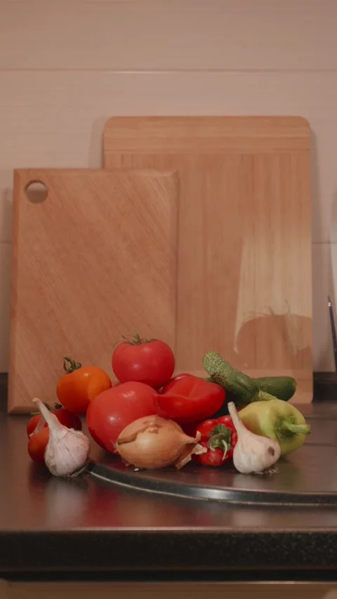 Freshly harvested organic vegetables on rustic kitchen table Stock Footage 340771204