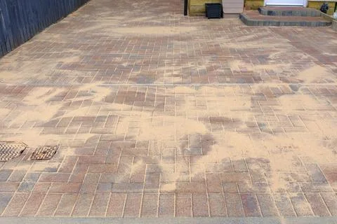 Freshly laid monoblock bricks form a smooth, structured path Stock Photos