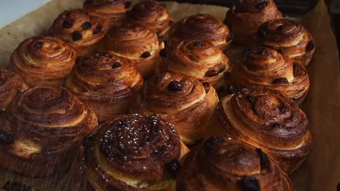 Freshly made buns. The concept of making delicious baked goods at home. Stock Footage 169404943