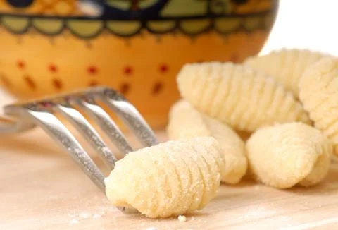 Freshly made gnocchi using a fork Stock Photos
