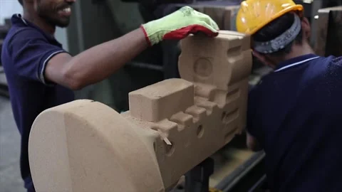 A freshly molded sand casting part in a manufacturing factory. Stock Footage 320991417