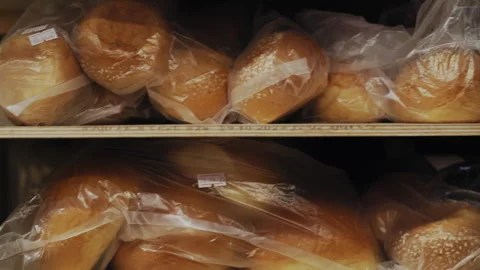 Freshly Packed Bread Loaves for Hot Dogs and Burgers Stock Footage 307089084