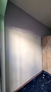 Freshly painted interior wall during home renovation and remodeling Stock Photos