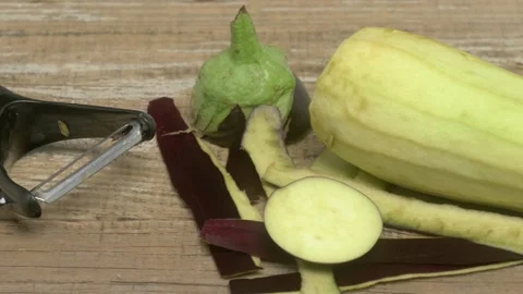 Freshly Peeled Vibrant Vegetables on a Rustic Wooden Surface, ready for culinary Видео 280603721