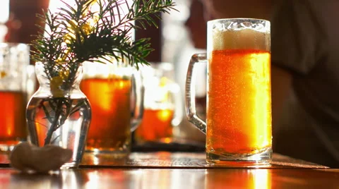 Freshly Poured Large Beer with Foam Stock Footage 64067510
