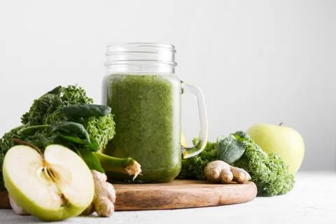 Freshly prepared jar of green smoothie, close up. Fresh vegetable smoothie on Stock Photos
