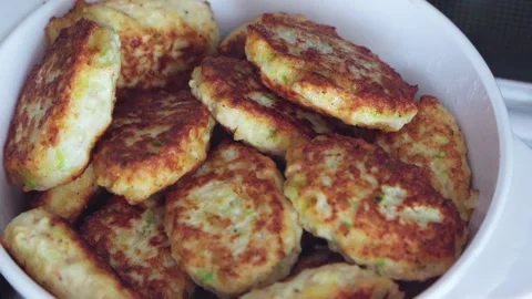 Freshly prepared meat cutlets are placed in saucepan. Stock Footage 280175314