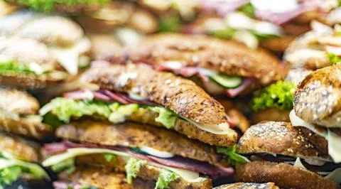 Freshly prepared sandwiches sold in a fast food restaurant. Stock Photos
