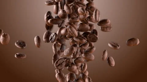 Freshly roasted coffee beans are captured in mid air, showcasing their rich Stock Footage 295989941