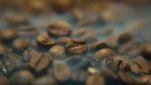Freshly Roasted Coffee Beans Close Up Macro Smokey Cinematic 4k Stock Footage 317472136