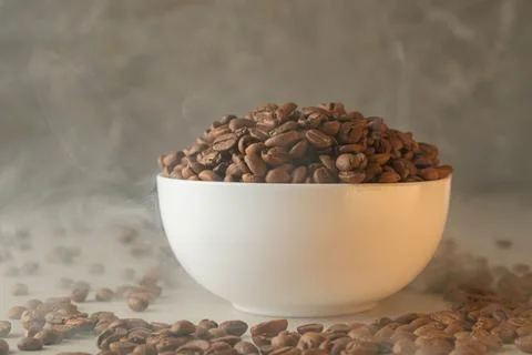 Freshly roasted coffee beans create an aromatic experience in a cozy kitchen Stock Photos