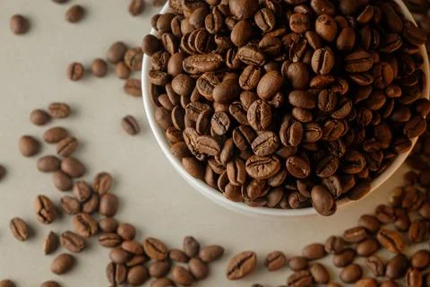Freshly roasted coffee beans create rich aromas in a cozy setting Stock Photos