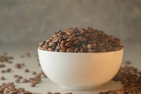 Freshly roasted coffee beans create a warm and inviting ambiance for mornings Stock Photos