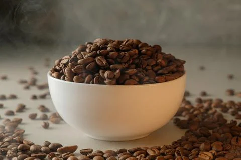 Freshly roasted coffee beans create an aromatic experience in a cozy setting Stock Photos
