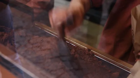 Freshly roasted coffee beans n a coffee roaster in Turkey Stock Footage 50449436