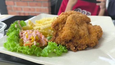 Freshly Served Chicken Chop on White Plate Ready to Eat Stock Footage 345509024
