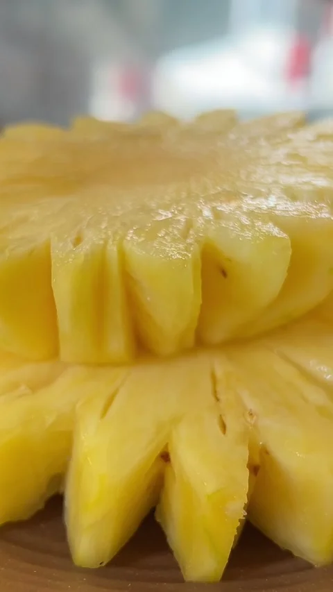 Freshly sliced pineapple on a plate. Stock Footage 307672004