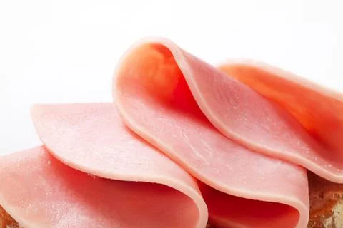 Freshly sliced pink ham on bread Stock Photos
