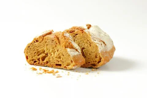 Freshly sliced rustic bread with crust Stock Photos