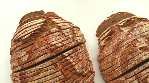 Freshly Sliced Whole Grain Bread on Marble Surface Stock Footage 308375705