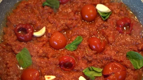 Freshly Tomato paste texture close-up with bazil and pepper 스톡 동영상 152772330