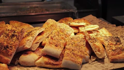 Freshly Turkish baked flatbreads Bazlama from a local bakery. Stock-Footage 320552880
