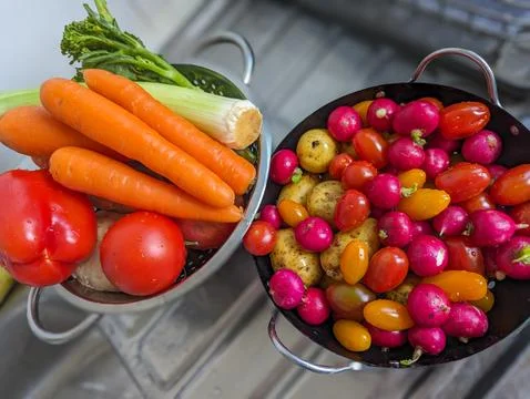 Freshly washed vegetables in strainer Stock Photos