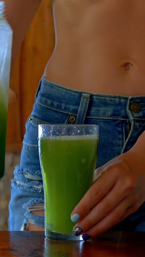 Freshness and natural. Process of making green drink from fresh ingredients like Stock Footage 287615764