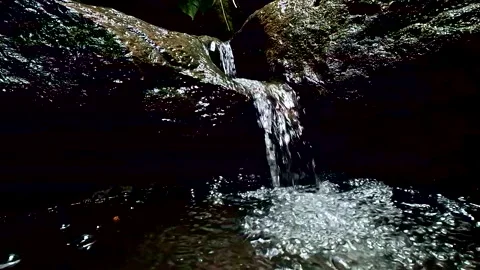 Freshwater conservation concept; small cascade with clear fresh water 库存影片 336923531