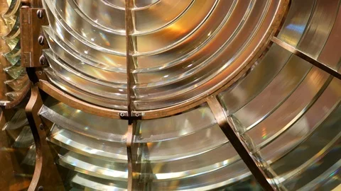 Fresnel lens with brass structure, nautical lighthouse tower. Detail of the Stock Footage 124543761