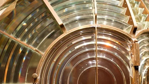 Fresnel lens with brass structure, nautical lighthouse tower. Detail of the Stock Footage 126480465