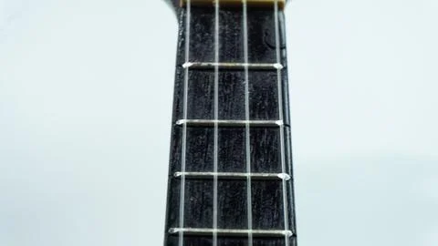 Fret Ukulele with 4 strings on a white background Stock Photos