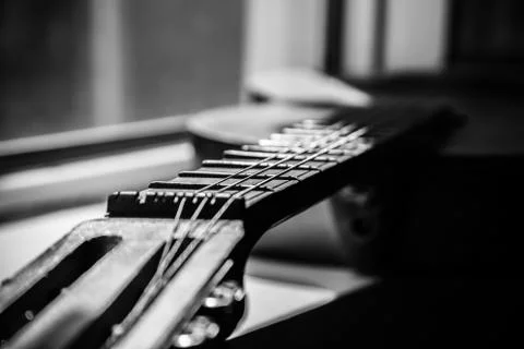 Fretboard of aged guitar Foto stock