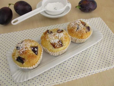 Friands with plums Stock Photos