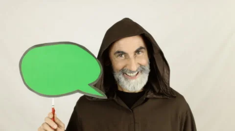 Friar holding green speech balloon funny Stock Footage 48198677