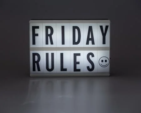 'Friday Rules Smile' in retro lightbox Stock Photos