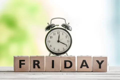 Friday sign with a classic clock Stock Photos