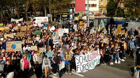 Fridays for Future kids marching in Germany. The school strike crowd is Stock Footage 117462162